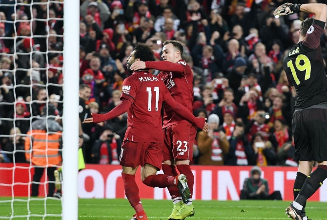Liverpool Maul Arsenal To Go Nine Points Clear